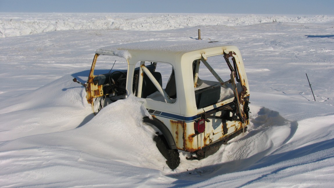 Old Jeep near the coastline