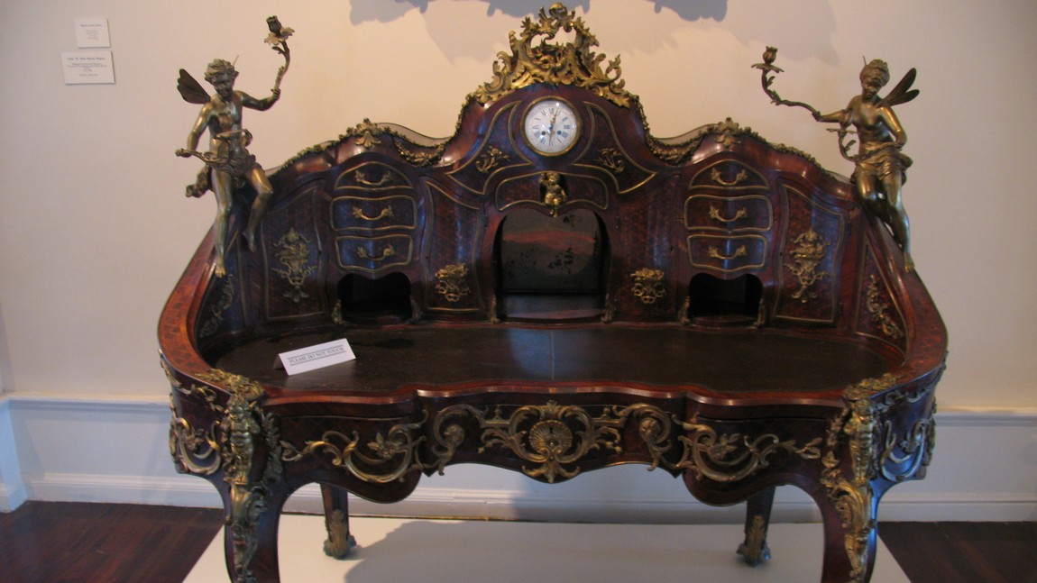 Desk with built in clock