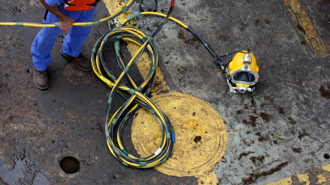 Worker preparing to make a dive