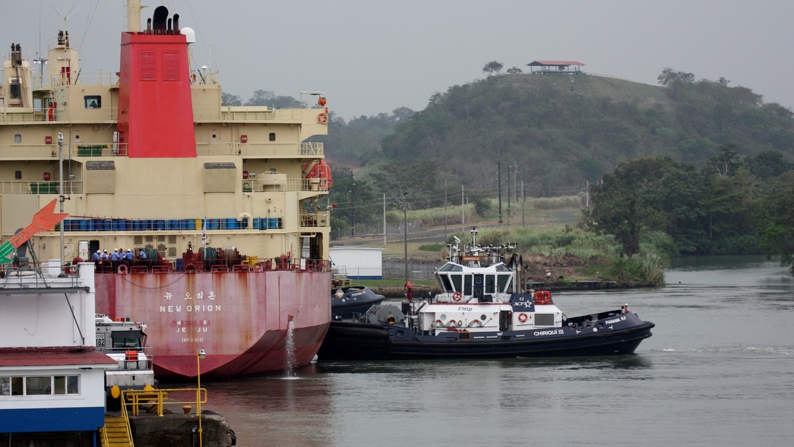 Guided into the canal by a tug boat