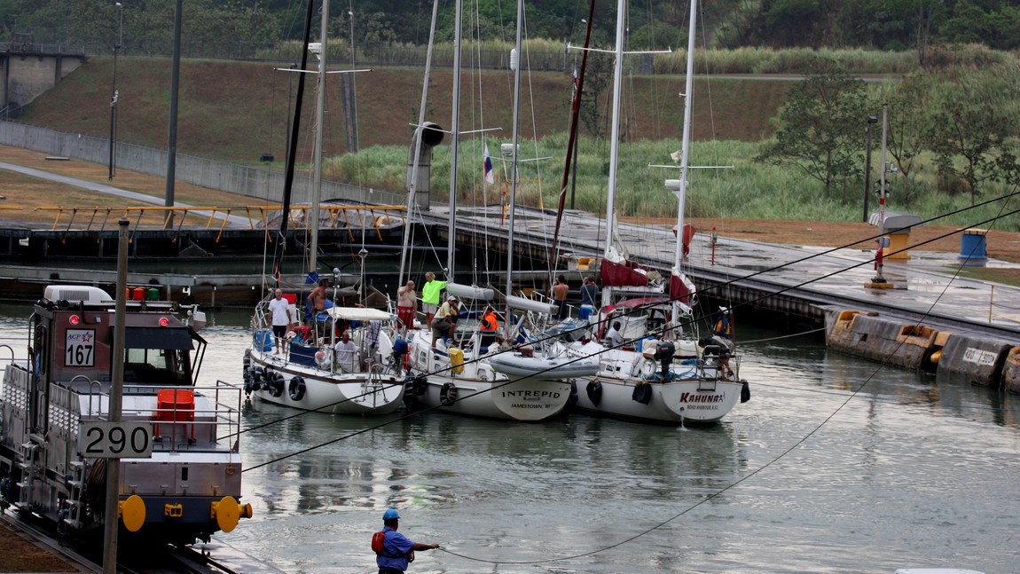 Three sailboats go through the locks