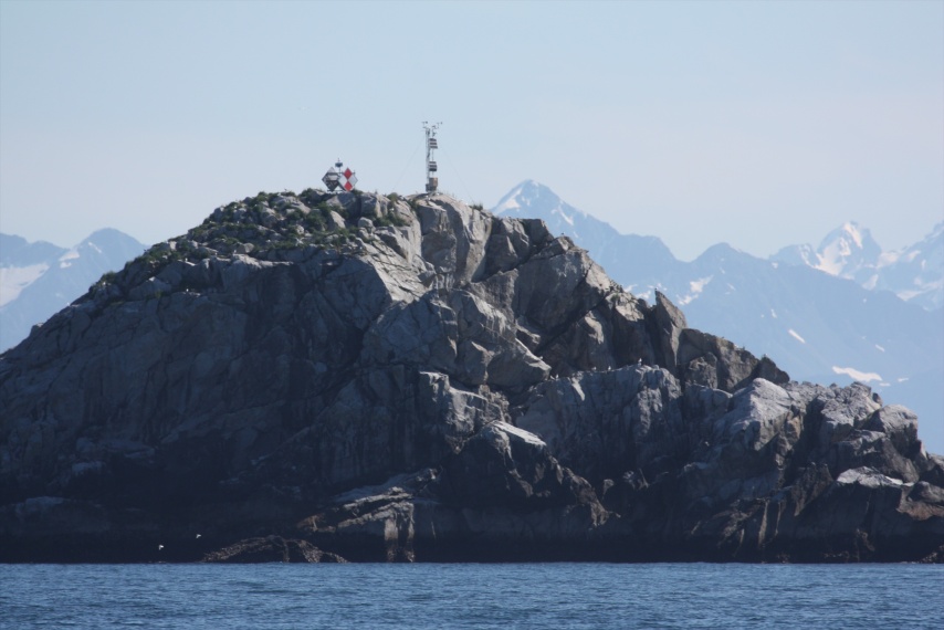 Navigation markers and a weather station at Aialik Cape