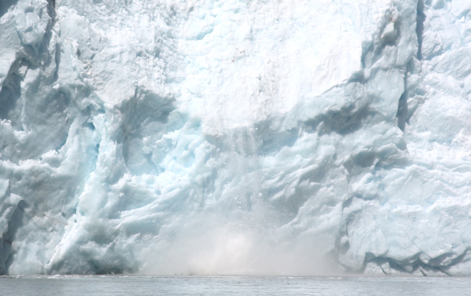 Ice splashing into the sea from the Northwestern Glacier