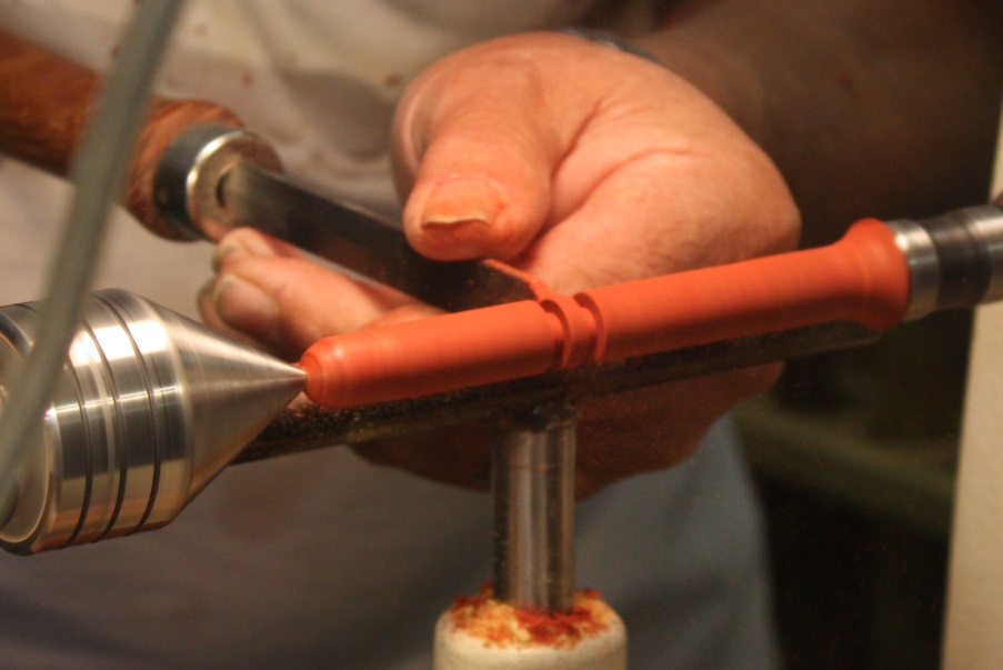 Preparing to make a ring in the center of the piece