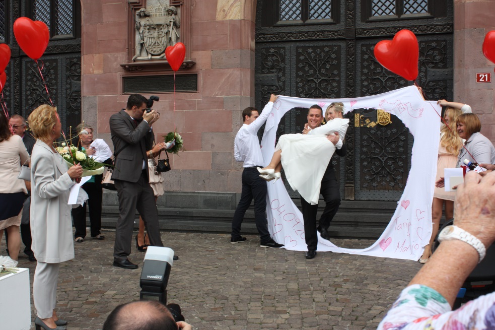 Cut a heart in a sheet then walk through