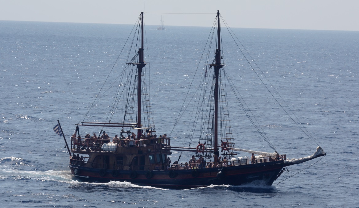 Interesting boat entering the Santorini Caldera