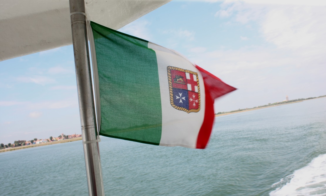 Flag on the back of the water taxi