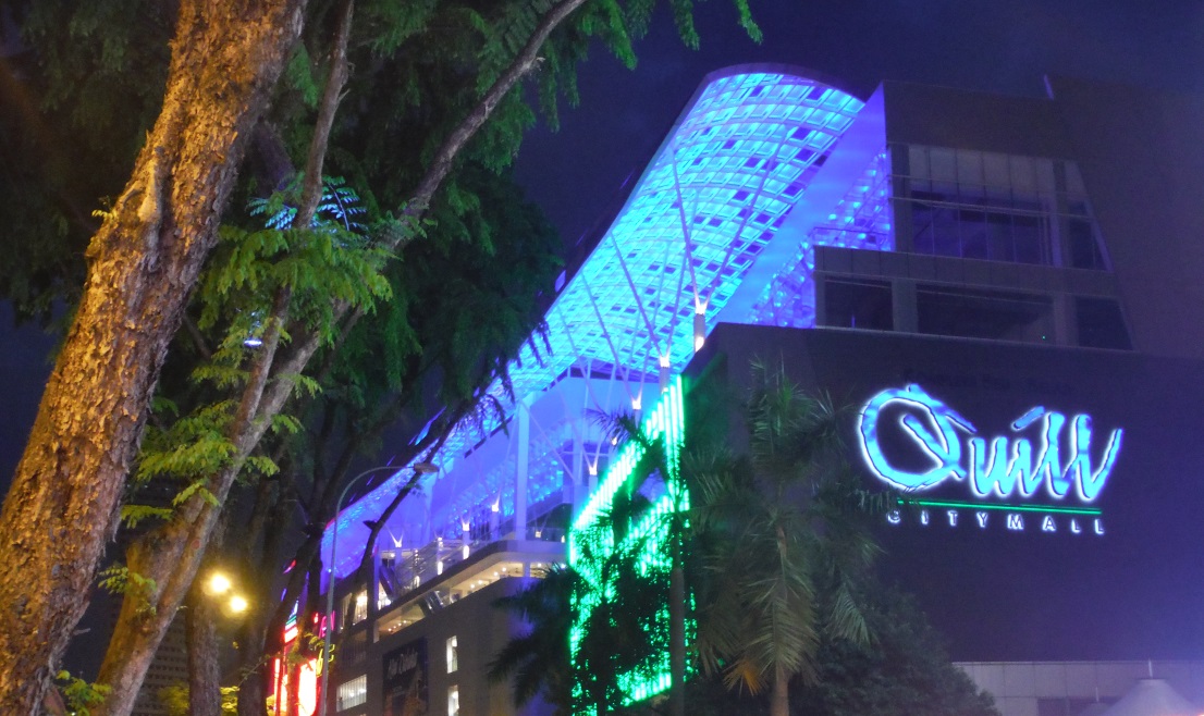 The Quill City Mall colorfully lit up at night