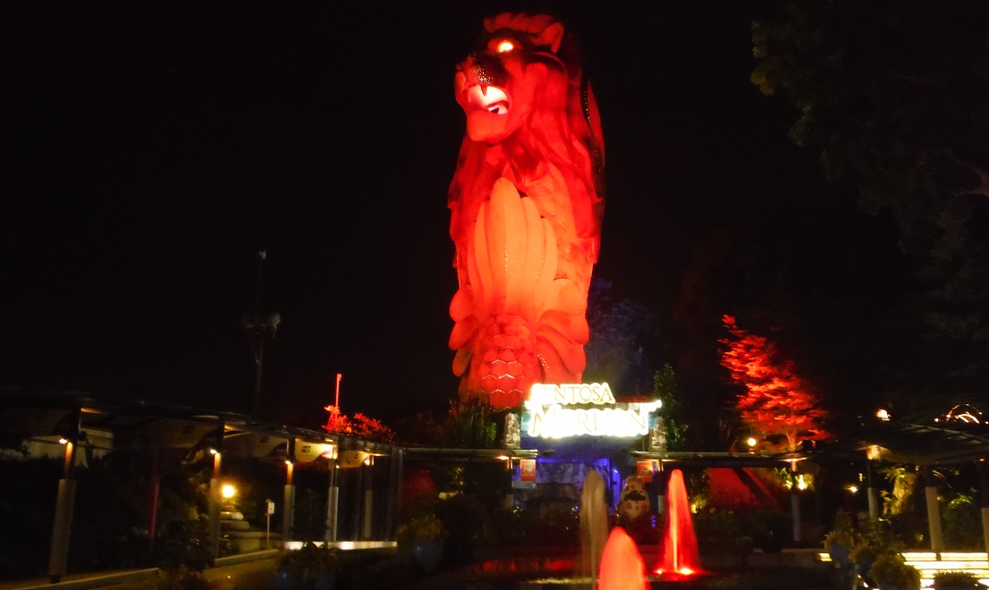 The lion is lit up red at night