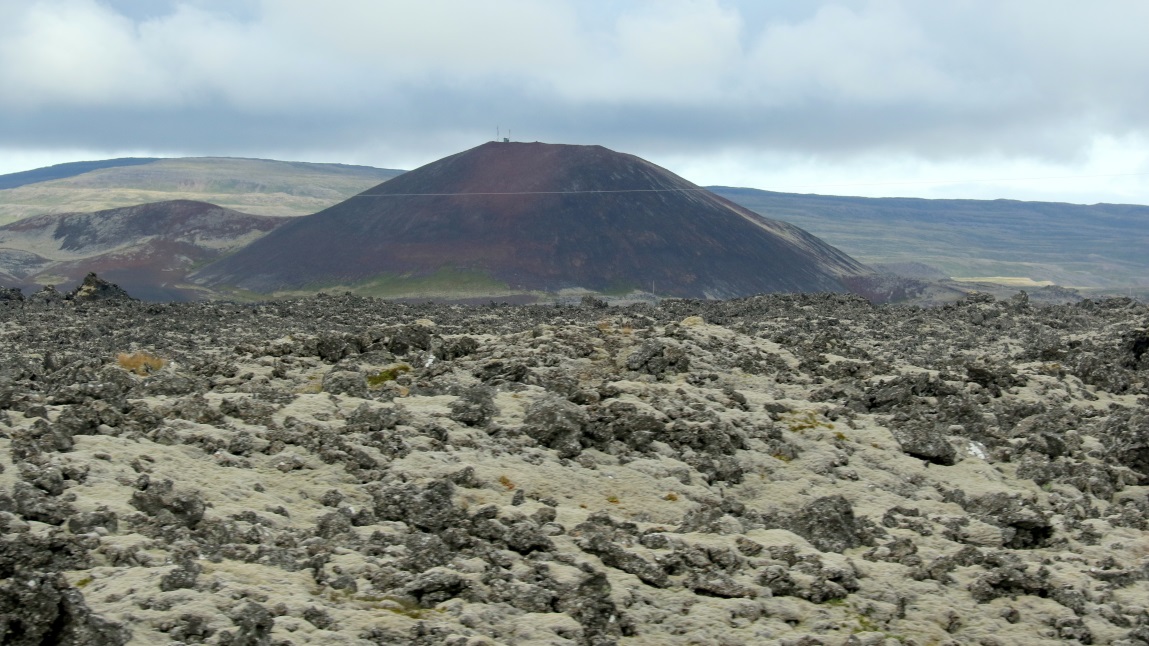 Ytri Rauamelsklur sticking above the lava