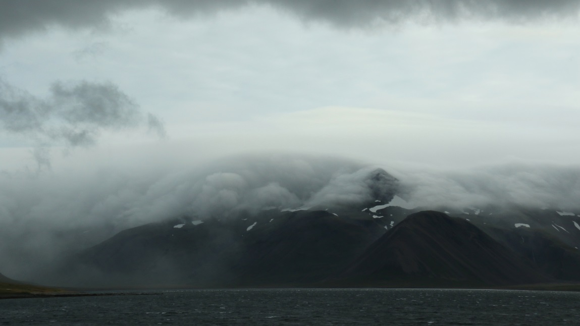 Amazing clouds over Bjarnarhfn Mountain