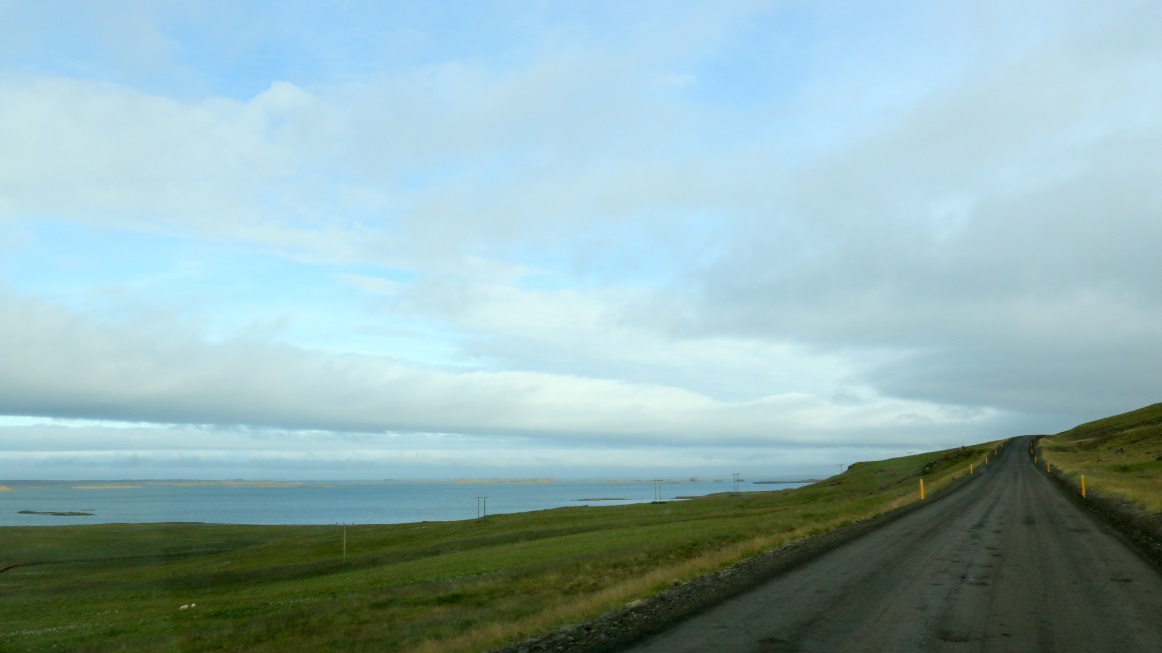 The road curves East
