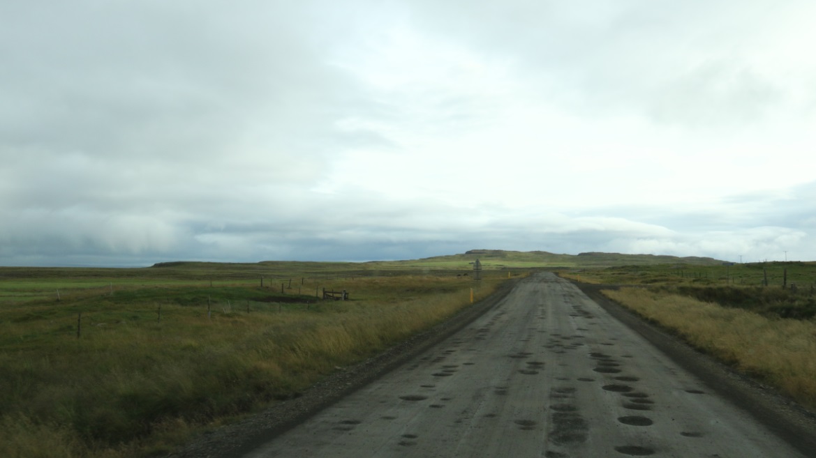 Some potholes on the dirt road