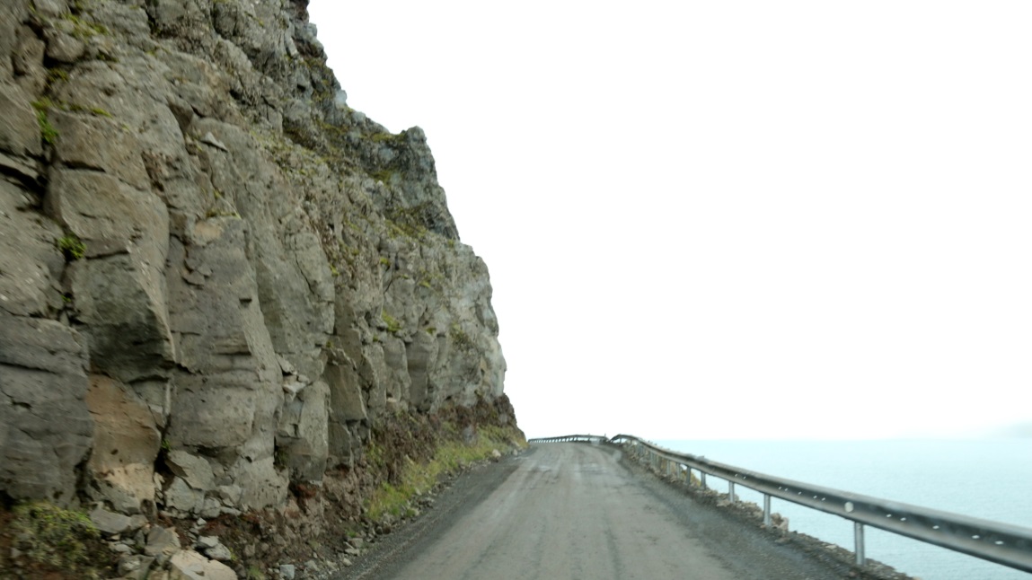 Road clings to the side