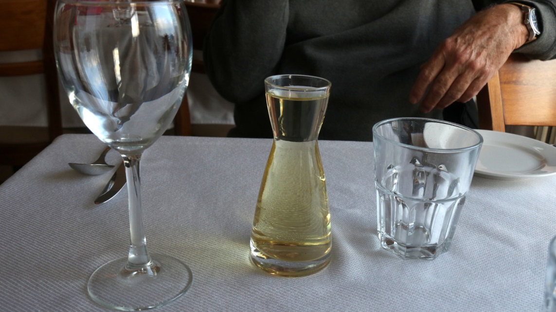 First the wine arrives