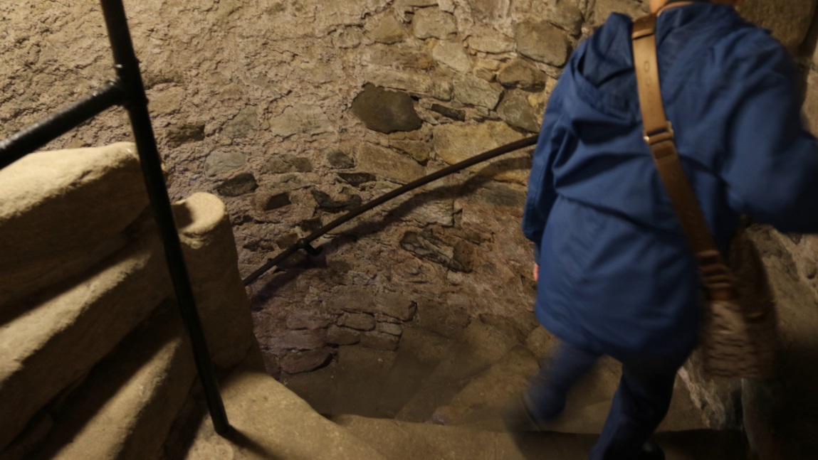 Stone spiral staircase leading to the dungeon