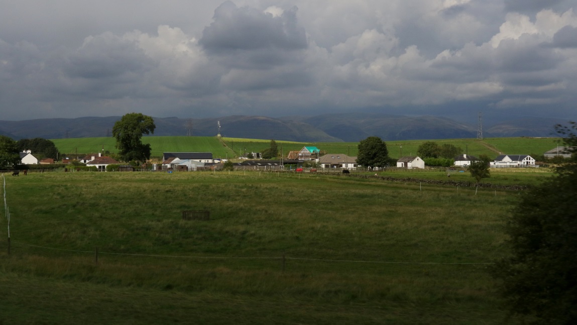 Farms and houses 1/2 mile West of Plean