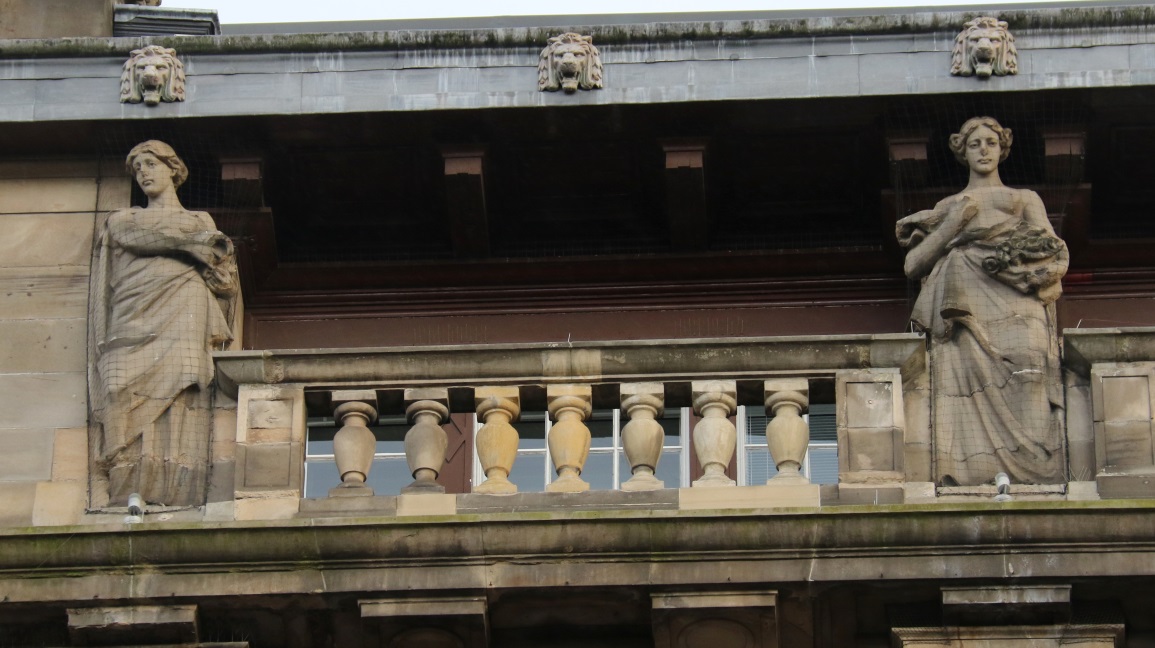 Statues on the upper floor