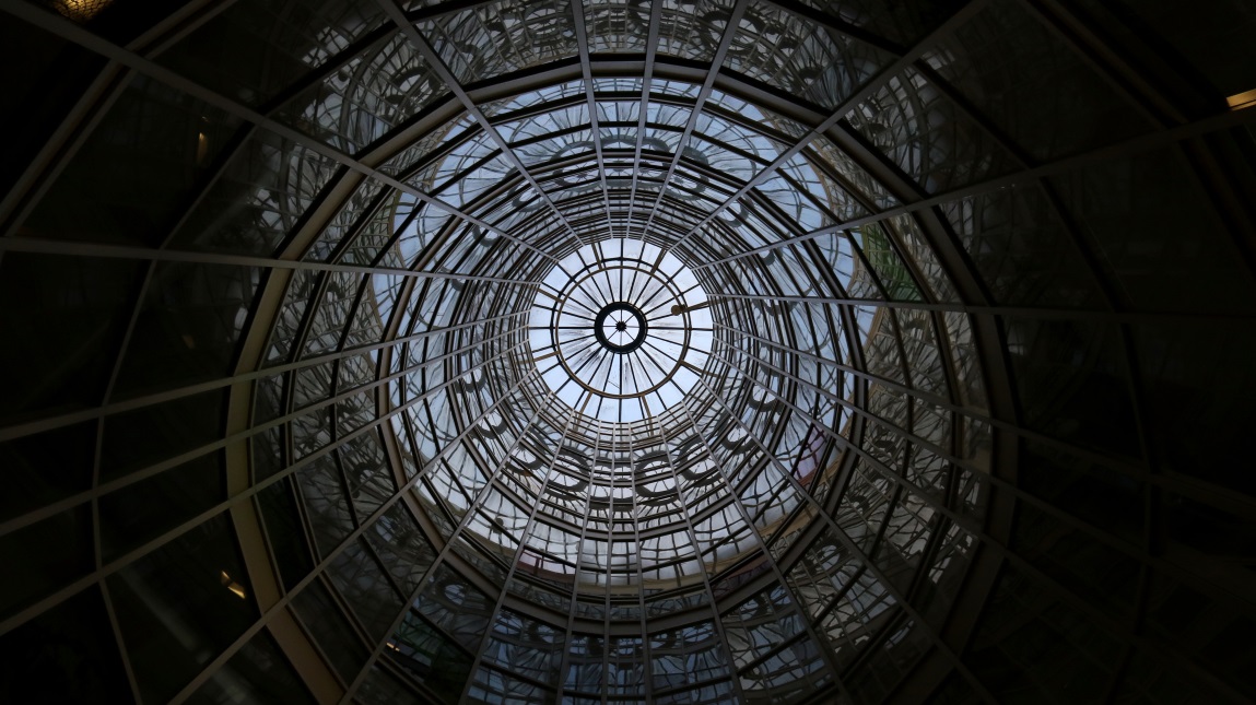 Looking up the huge glass tower