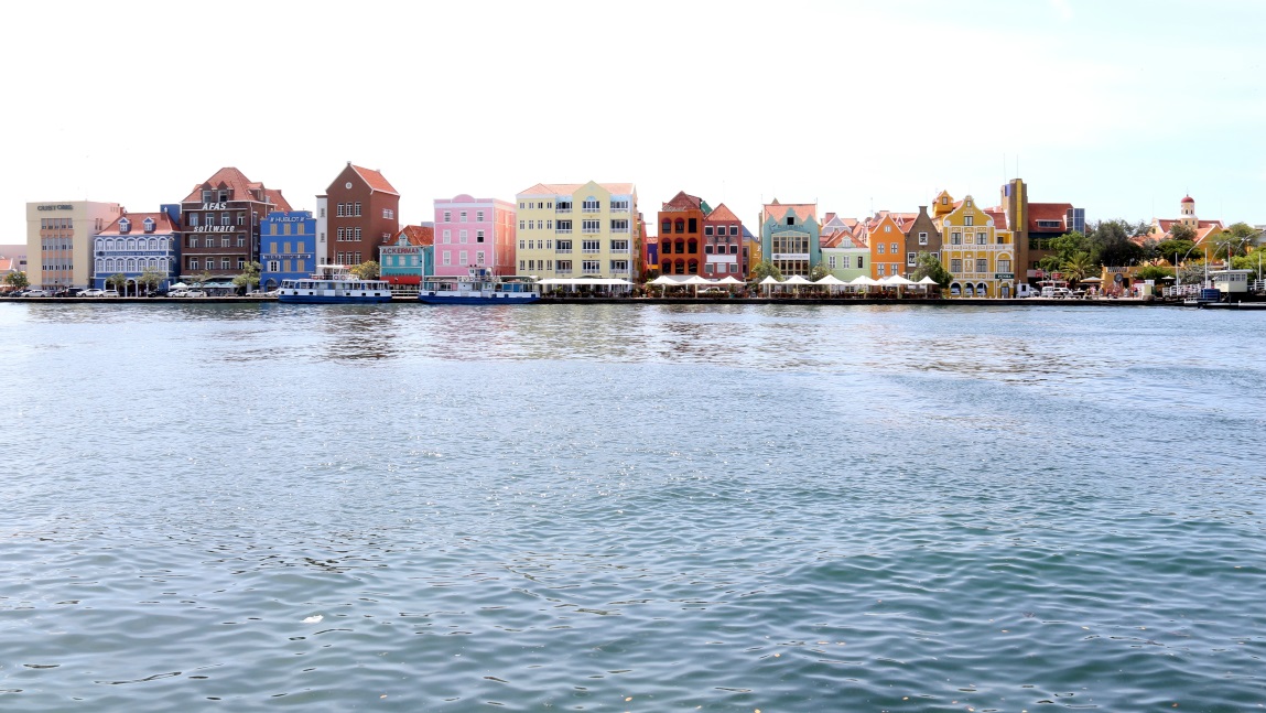 Colorful buildings line the waterfront