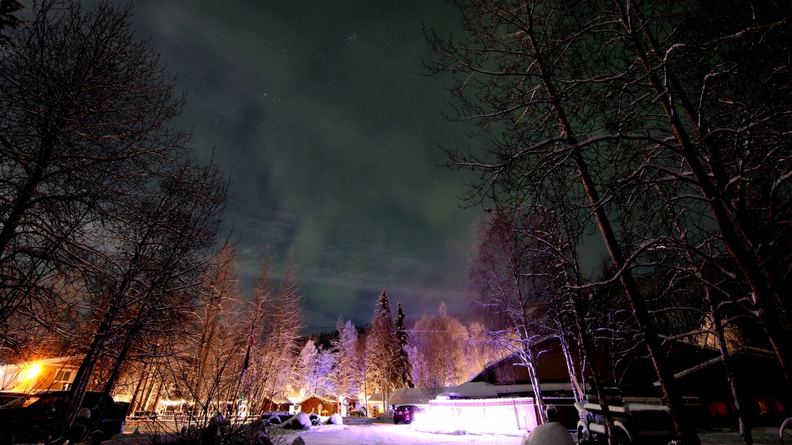 Glowing green sky over the resort