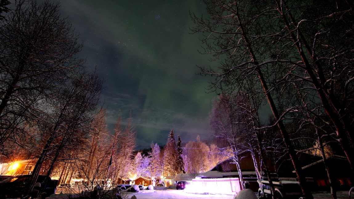 Glowing green sky over the resort
