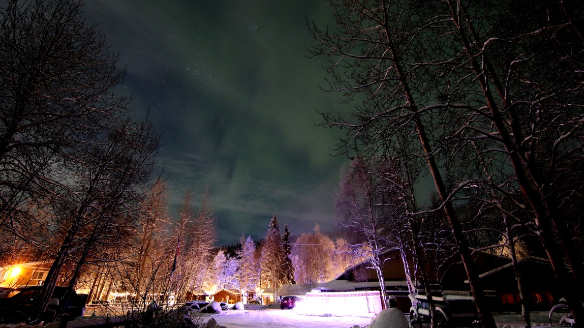 Glowing green sky over the resort