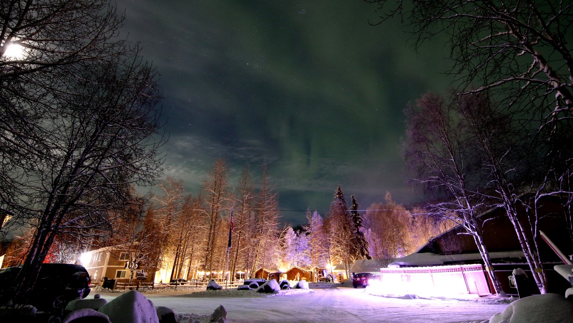 Glowing green sky over the resort