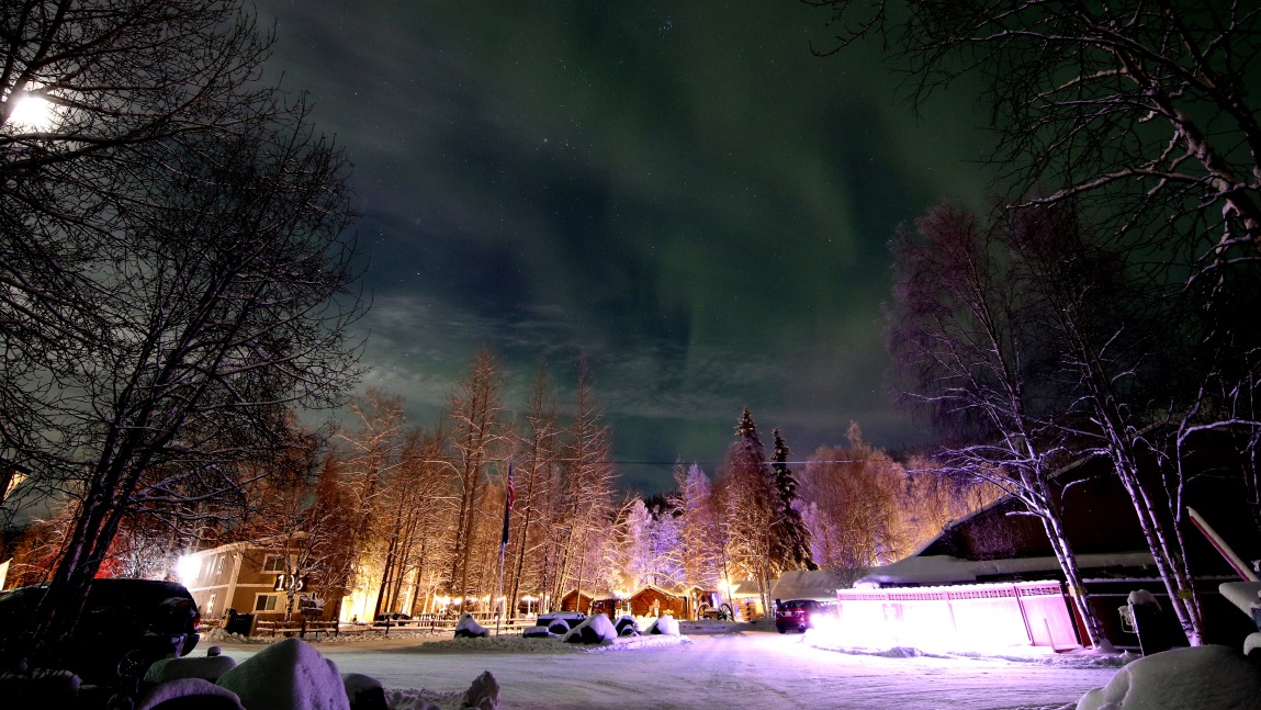 Glowing green sky over the resort