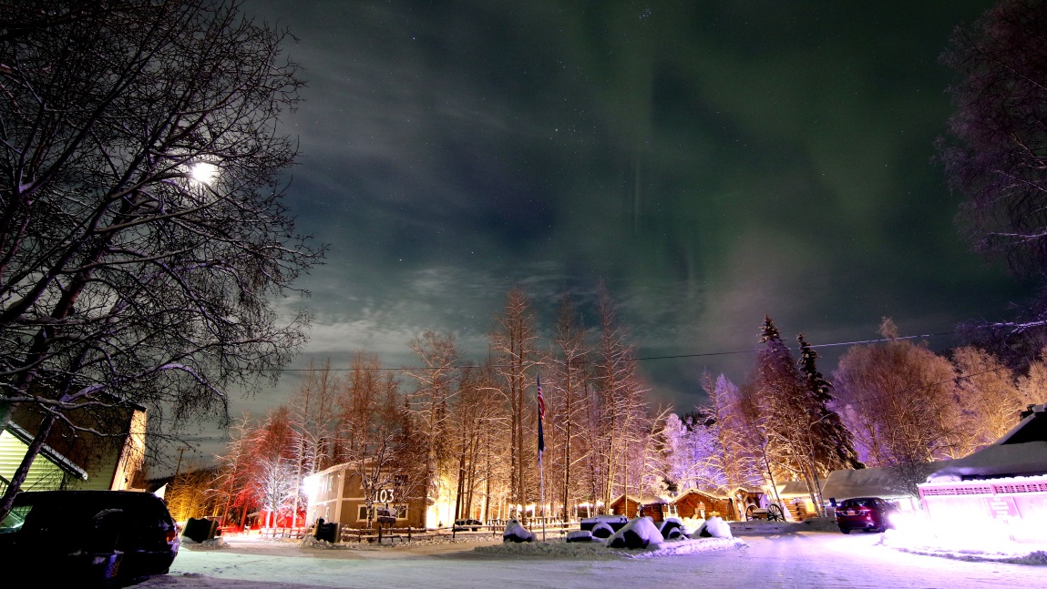 Glowing green sky over the resort