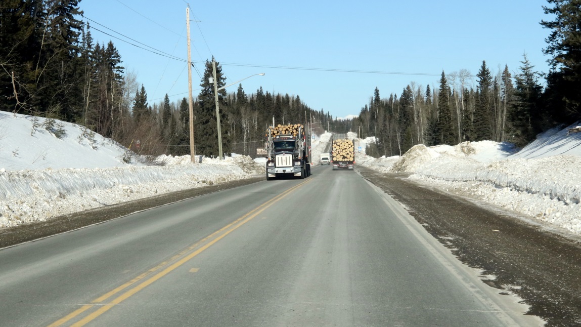 Log trucks at McLeod Lake