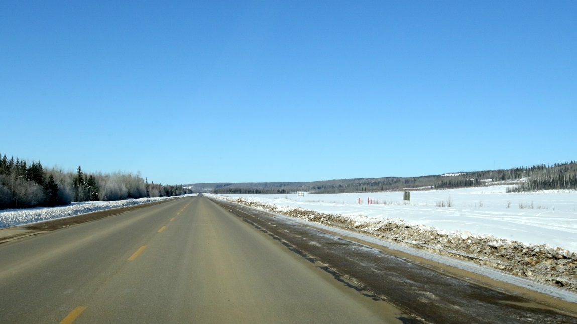 Farmland two miles west
