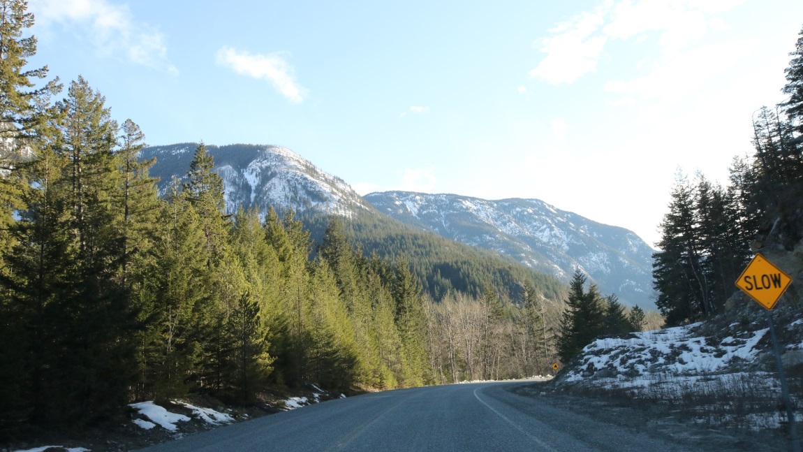 Pavement resumes at the bottom of the pass